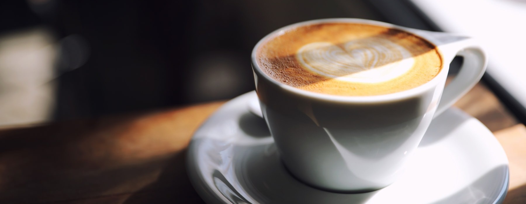a cup of coffee on a saucer